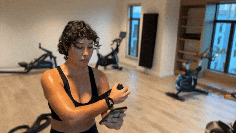 A GIF of a fitness enthusiast using data-driven insights to track performance. | Tricorder Zero